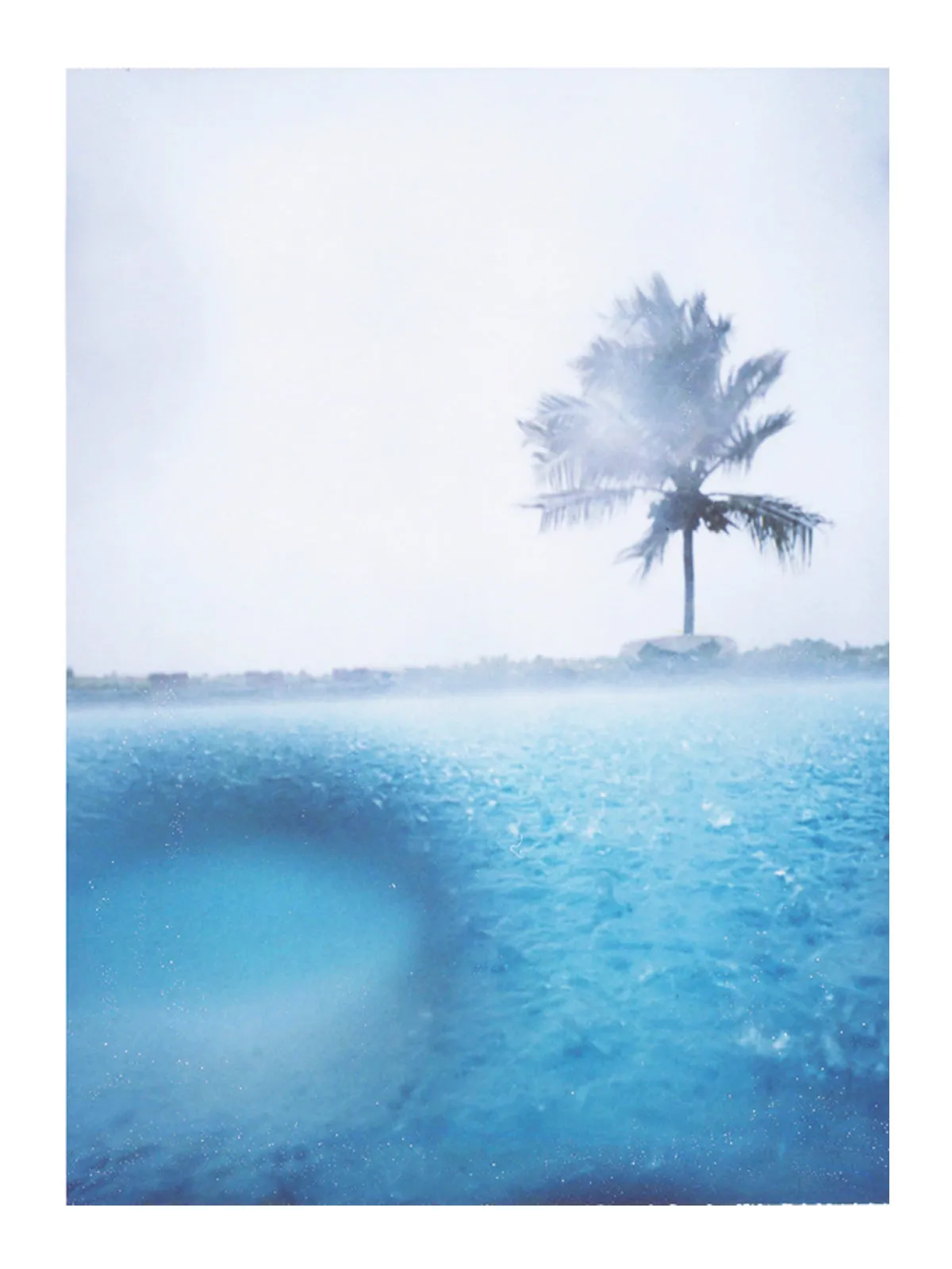 The warm rain makes the blue paint splatter